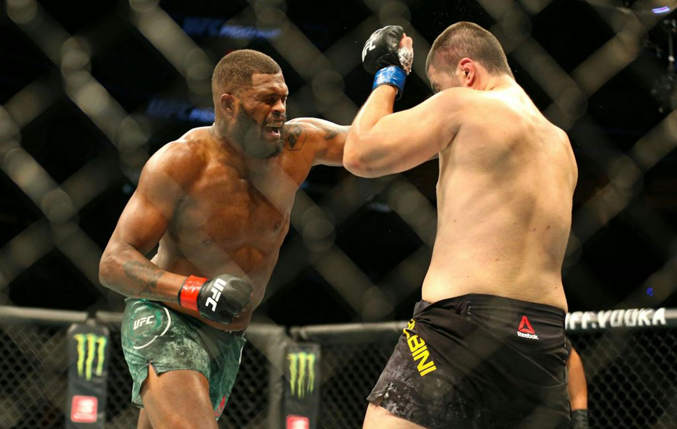 Maurice Green lands a punch in his heavyweight preliminary match against Junior Albini. Green is a St. Cloud, MN native and crowd favorite. He beat Albini by TKO. ALEX KORMANN ¥ alex.kormann@startribune.com UFC Fight Night was held at Target Center on Saturday June 29, 2019. Francis Ngannou and Junior Dos Santos headlined the event.