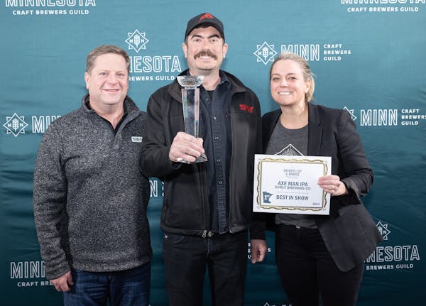 Representatives from Surly Brewing accept the best in show award at the Minnesota Brewers Cup.