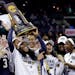 Notre Dame's Arike Ogunbowale holds the trophy after defeating Mississippi State in the final of the women's NCAA Final Four college basketball tourna