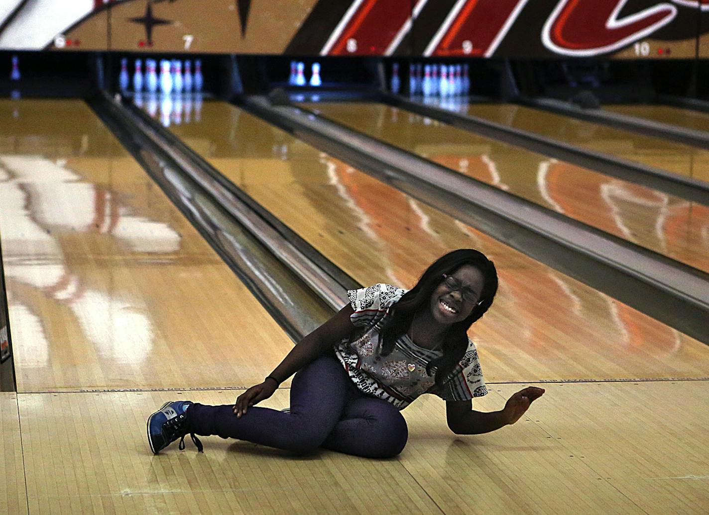 Sera Mugeta, 14, reacted after her second shot left one pin standing. ] JIM GEHRZ&#x201a;&#xc4;&#xa2;jgehrz@startribune.com (JIM GEHRZ/STAR TRIBUNE) / March 19, 2013 / 12:30 PM Minneapolis, MN &#x201a;&#xc4;&#xec; BACKGROUND INFORMATION: More than 100 students from Minneapolis South High School gathered at Memory Lanes to apply an earlier lesson in the physics of bowling to the test. The 9th graders first attended morning classes in which they rotated through stations that covered the history of