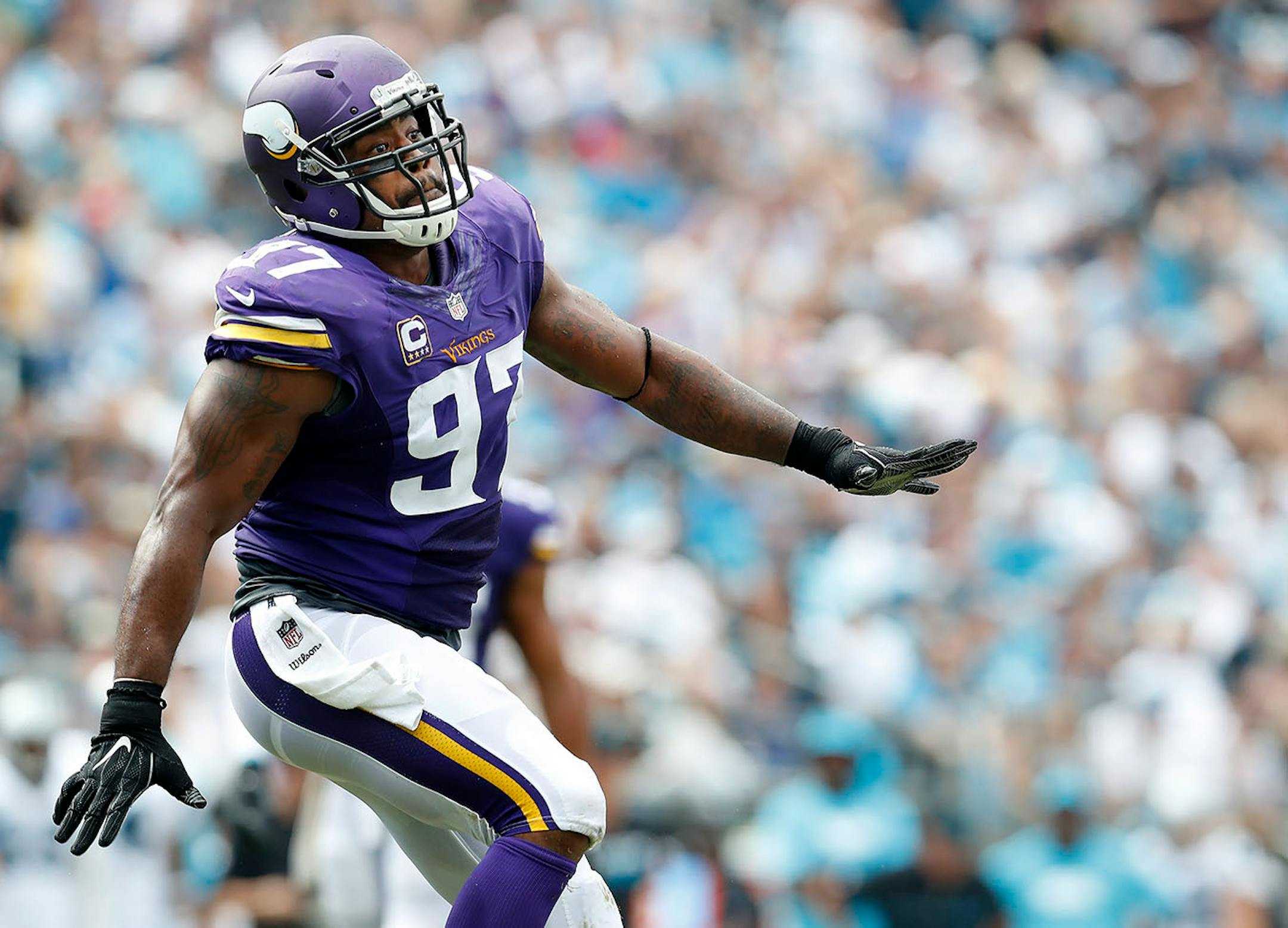Everson Griffen (97) celebrated after sacking Cam Newton (1) in the fourth quarter.