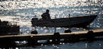 A fishing boat cruised on Wahkon Bay, Lake Mille Lacs in the afternoon sun in the city of Wahkon, MN ] Thursday, May 22, 2014 GLEN STUBBE * gstubbe@st