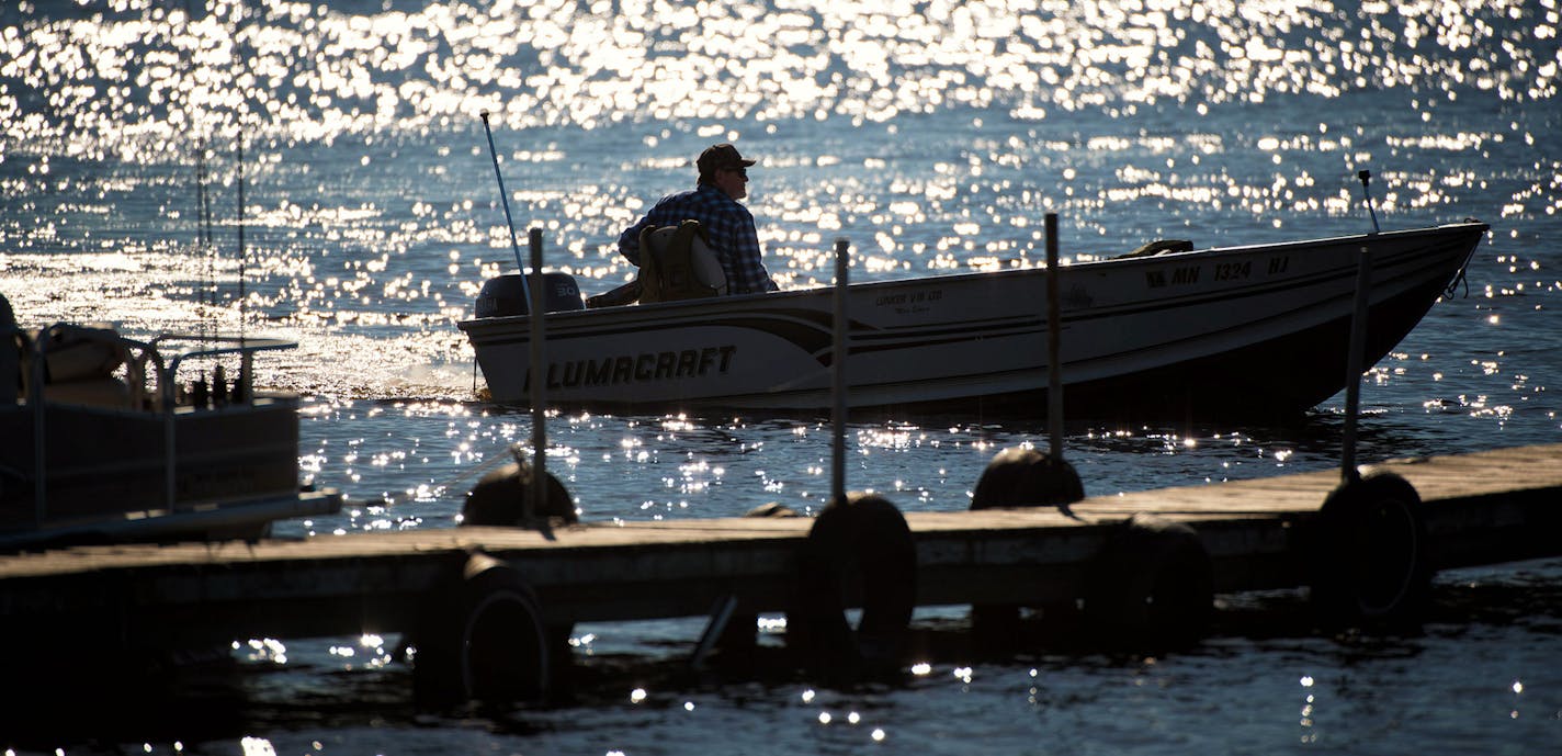 A fishing boat cruised on Wahkon Bay, Lake Mille Lacs in the afternoon sun in the city of Wahkon, MN ] Thursday, May 22, 2014 GLEN STUBBE * gstubbe@startribune.com ORG XMIT: MIN1405231359580579 ORG XMIT: MIN1507291131590014