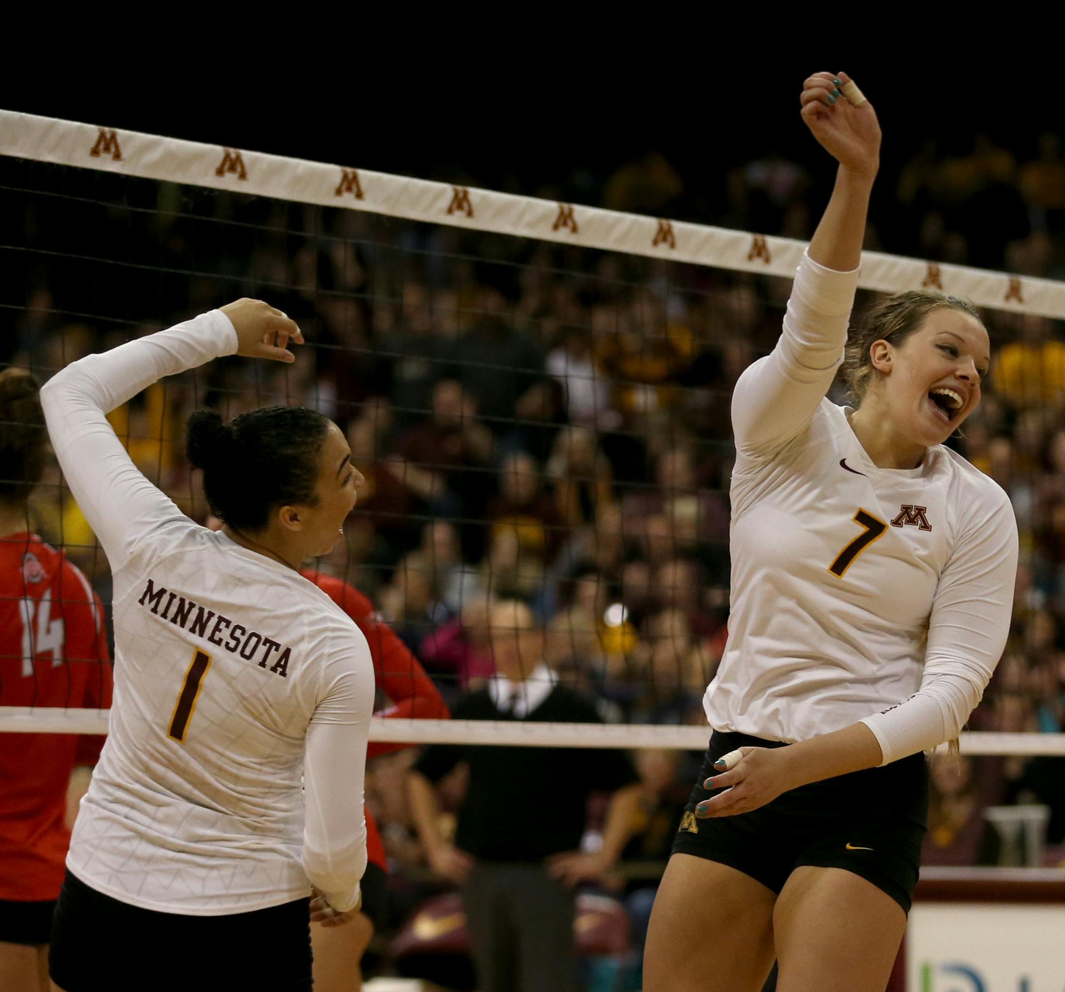 Gophers Daly Santana and Hannah Tapp after making a successful block in the final set. ] (KYNDELL HARKNESS/STAR TRIBUNE) kyndell.harkness@startribune.com Gophers vs Ohio State in volleyball at the Sports Pavilion in Minneapolis Min., Wednesday November 25, 2015. Gophers won over Ohio State 3-2.