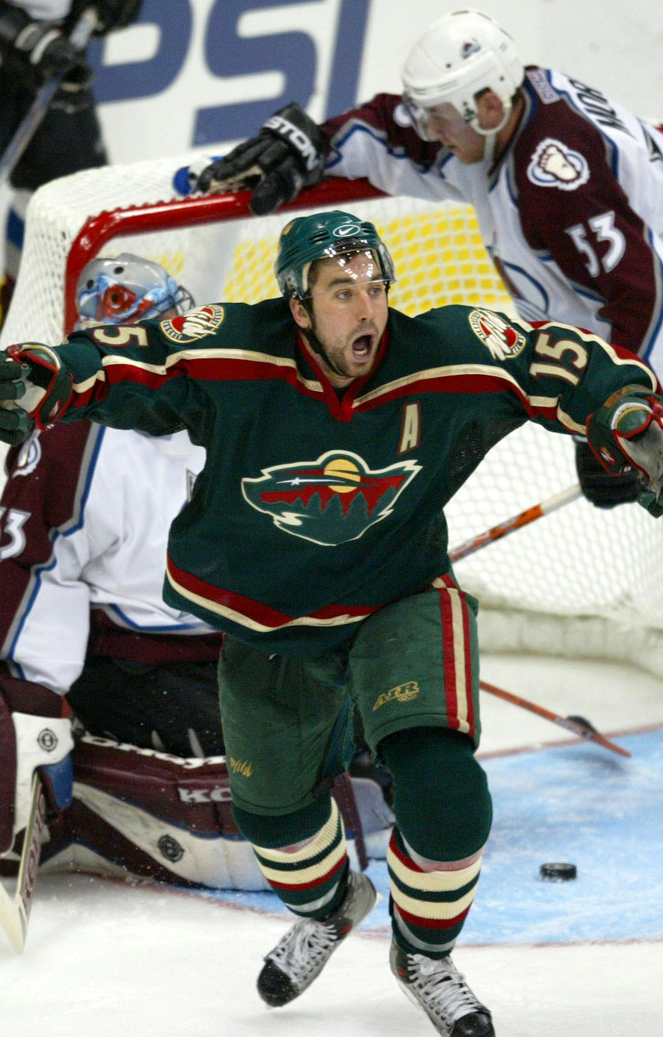Denver, CO. Tuesday 4/22/2003 - Minnesota Wild -VS- Colorado Avalanche, Game 7 Game Winner!!!!! // Andrew Brunette scores the winning goal in overtime. ORG XMIT: MIN2013021319194157 ORG XMIT: MIN1305011509113020