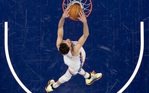 Chet Holmgren gets two the easy way Monday night in Oklahoma City's victory over the Timberwolves at Target Center.