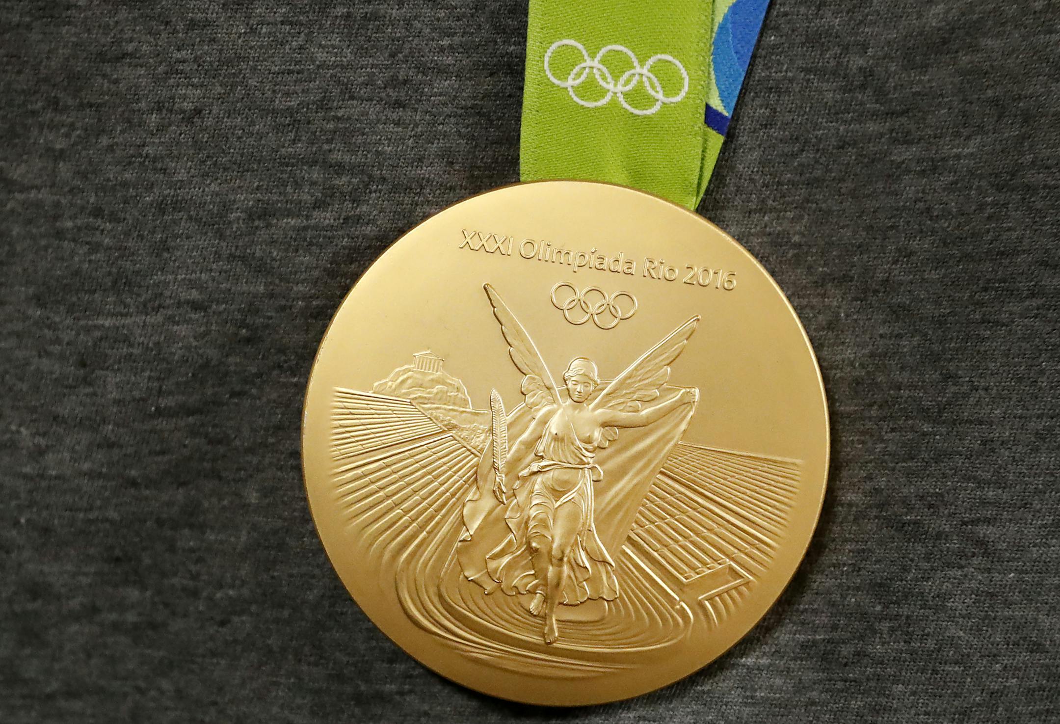 An Olympic Gold Medal worn by Maya Moore. ] CARLOS GONZALEZ cgonzalez@startribune.com - August 22, 2016, Minneapolis, MN, MSP Airport, Four members of the Minnesota Lynx and coach Cheryl Reeve arrive home from the Olympics. Gold Medal Women&#xed;s Basketball