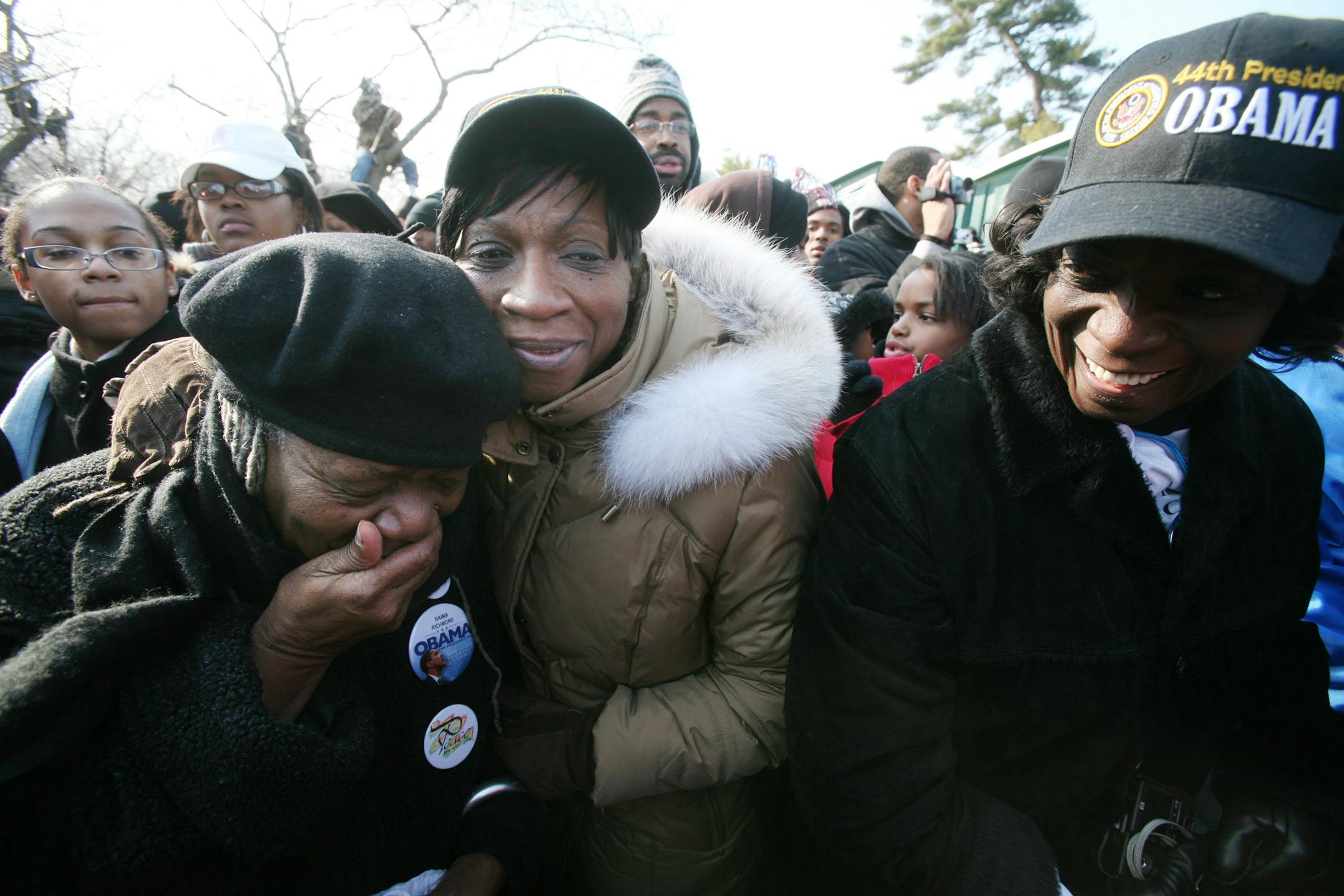 Naima Richmond of Minneapolis, left, was overcome with emotion as Barack Obama was sworn in. With her were Barbara Doyle, center, and Doyle's sister, Gaynell Ballard, both of St. Paul. "There are no words to describe what this is," Ballard said.