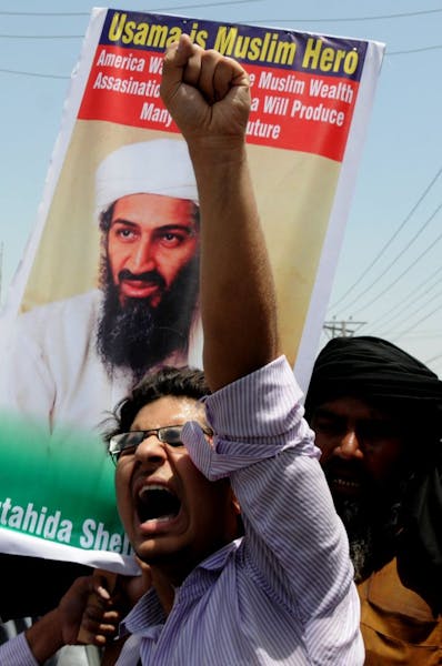 A Pakistani man chants anti-American slogans during a rally to condemn the killing of al-Qaida leader Osama bin Laden in Multan, Pakistan on Wednesday