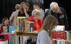 Thousands of people browsed through rows of books at the Twin Cities Book Festival in 2012. This year's festival, the 20th, is virtual.