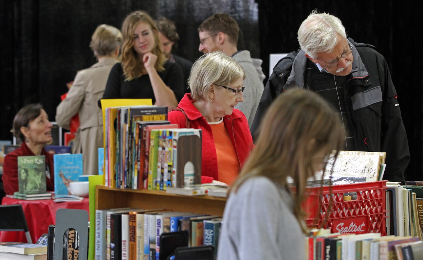 Thousands of people browsed through rows of books at the Twin Cities Book Festival in 2012. This year's festival, the 20th, is virtual.