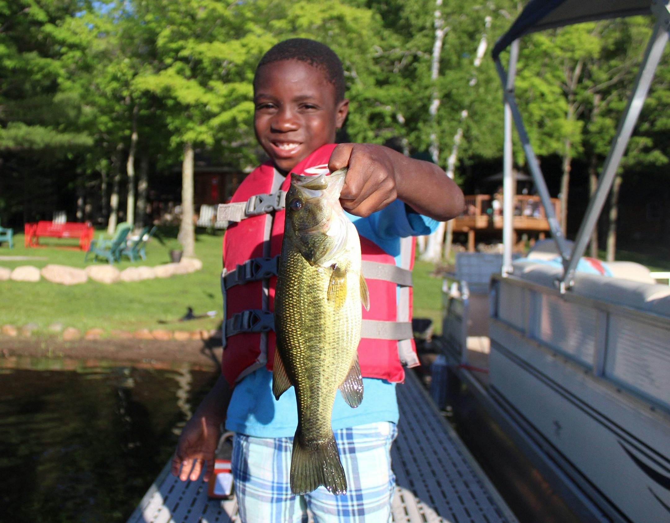 John Kerry Savage, who recently turned 8 years old, is already an avid angler. He caught this fish at his family's cabin near Deerwood, Minn. When his family is at the cabin, he likes to spend all of his time fishing.