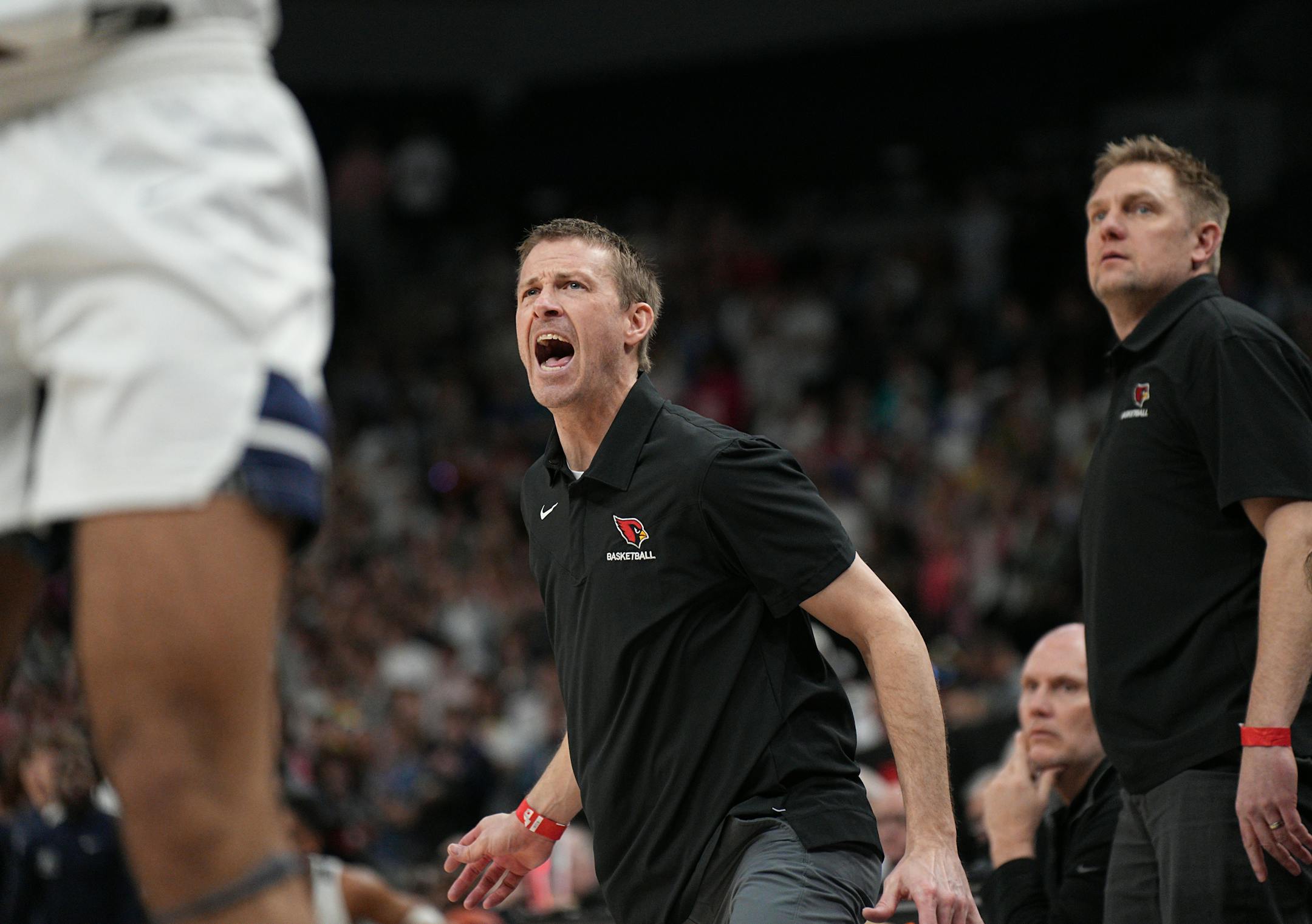Alexandria coach Forest Witt reacts during the first half.