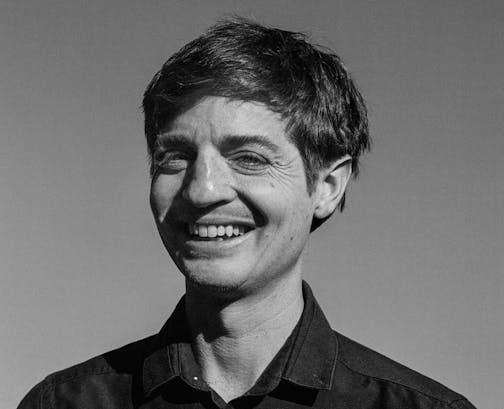 black and white photo of author Simon Rich