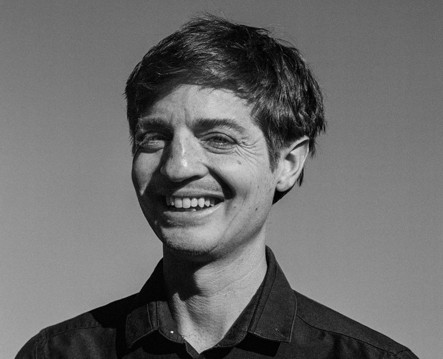 black and white photo of author Simon Rich