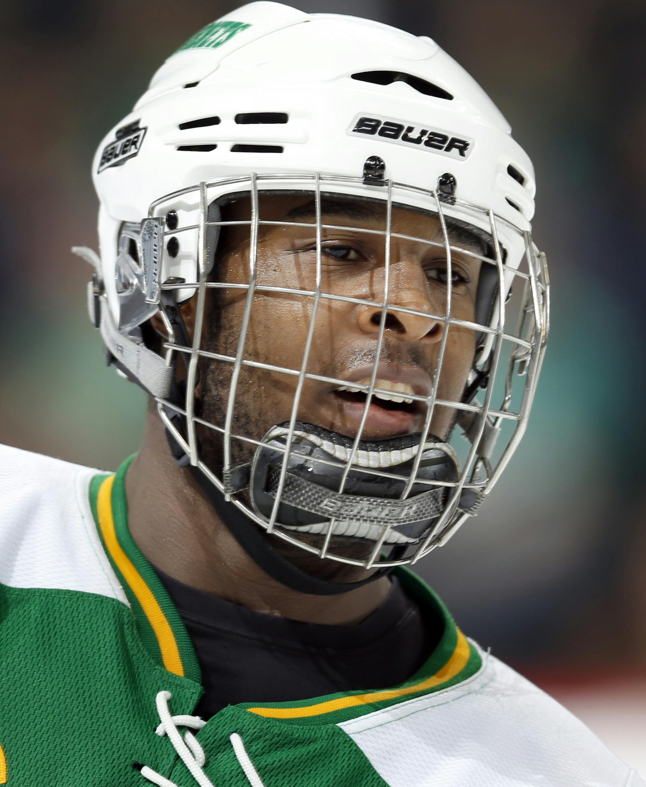 Anthony Walsh (4) skated back to the bench after scoring in the second period. ] CARLOS GONZALEZ cgonzalez@startribune.com - March 9, 2013, St. Paul, Minn., Xcel Energy Center, Minnesota High School Boys State Hockey, 2A Finals, Hill Murray vs. Edina