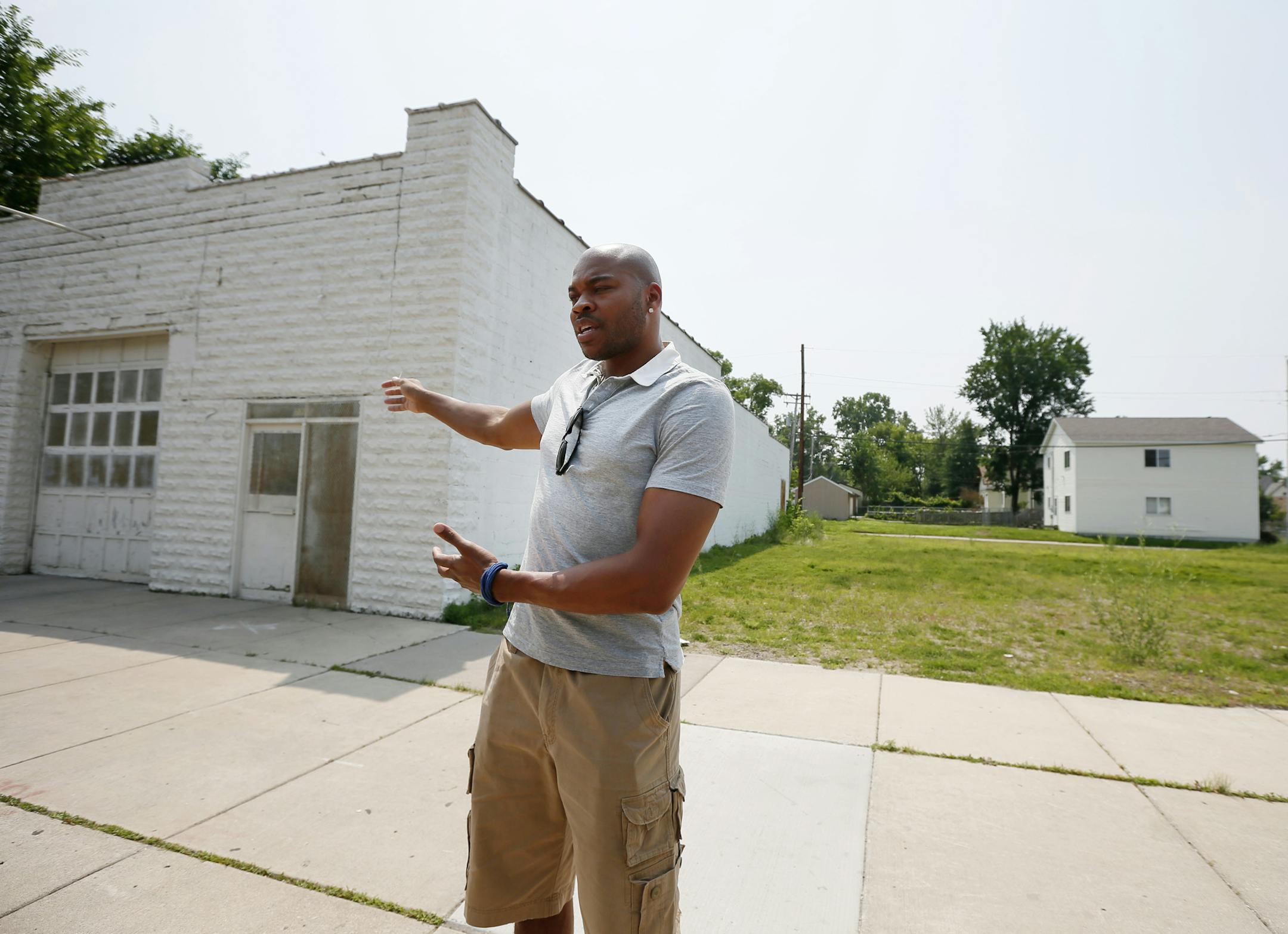 Former NBA player and Augsburg star Devean George looked over the lots at Golden Valley Road and Penn Avenue in north Minneapolis. George plans to build affordable housing at this location. The Commons at Penn Avenue, an $11.5 million project, is scheduled to begin construction next summer.