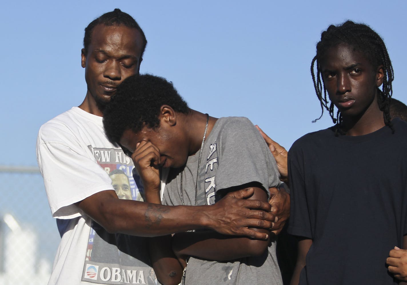 In 2011, Jose Morgan held Malik, then 13, during a peace vigil on West Broadway. Malik&#x2019;s friend, Ray&#x2019;Jon Gomez, had been shot dead the day before.