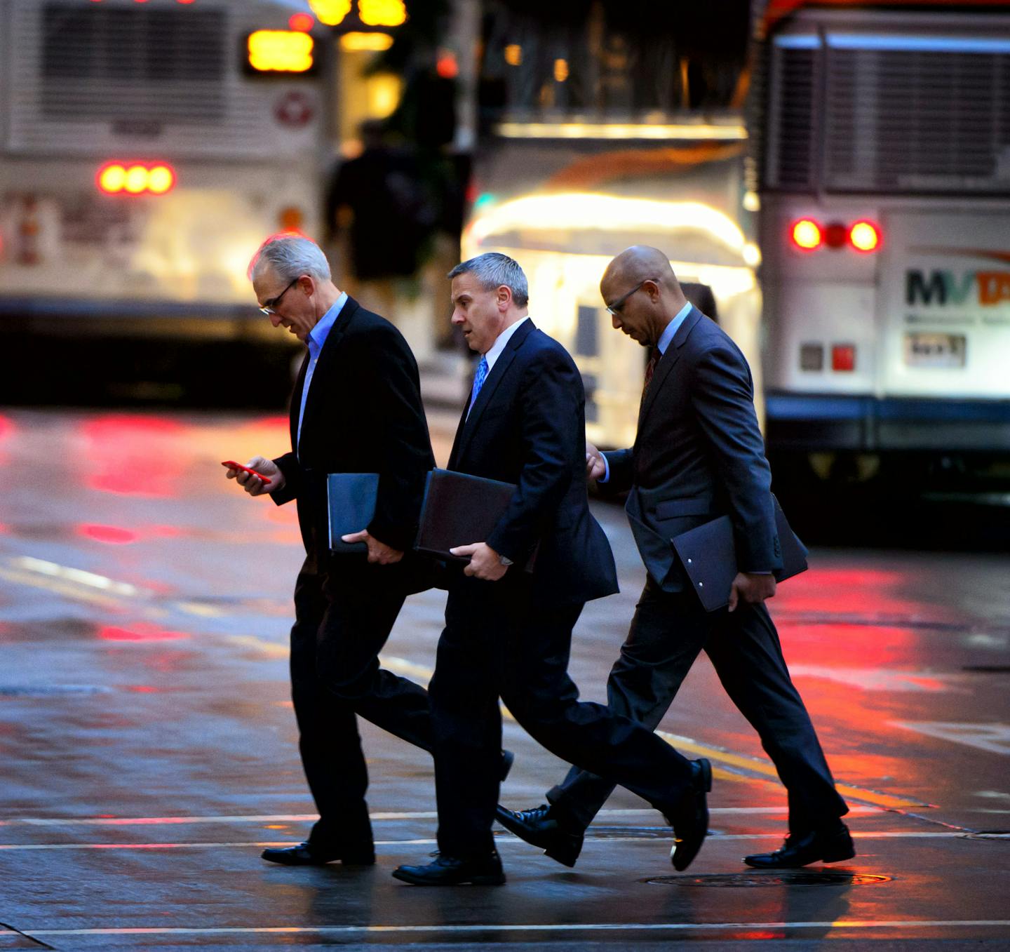 Pedestrians used their mobile devices while crossing Nicollet Mall in Minneapolis.