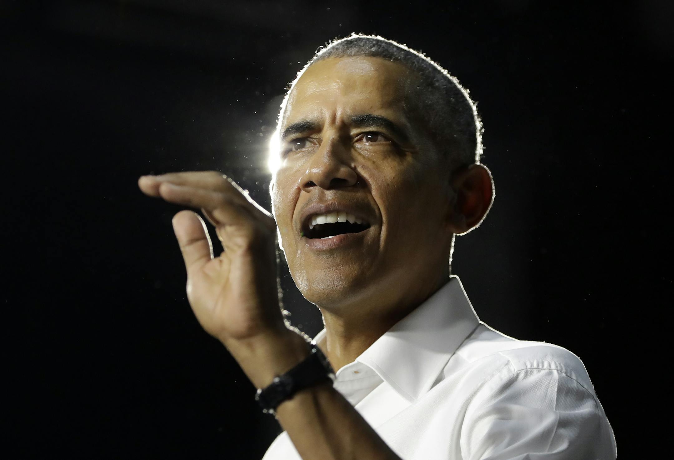 FILE - In this Nov. 2, 2018, file photo, former President Barack Obama speaks during a campaign rally for Democratic candidates in Miami. Nearly eight years after he was last on the ballot, Obama is emerging as a central figure in the 2020 presidential election. Democrats are eagerly embracing Obama as a political wingman for Joe Biden, who spent two terms by his side as vice president. Obama remains the party's most popular figure, particularly with black voters and younger Democrats. (AP Photo