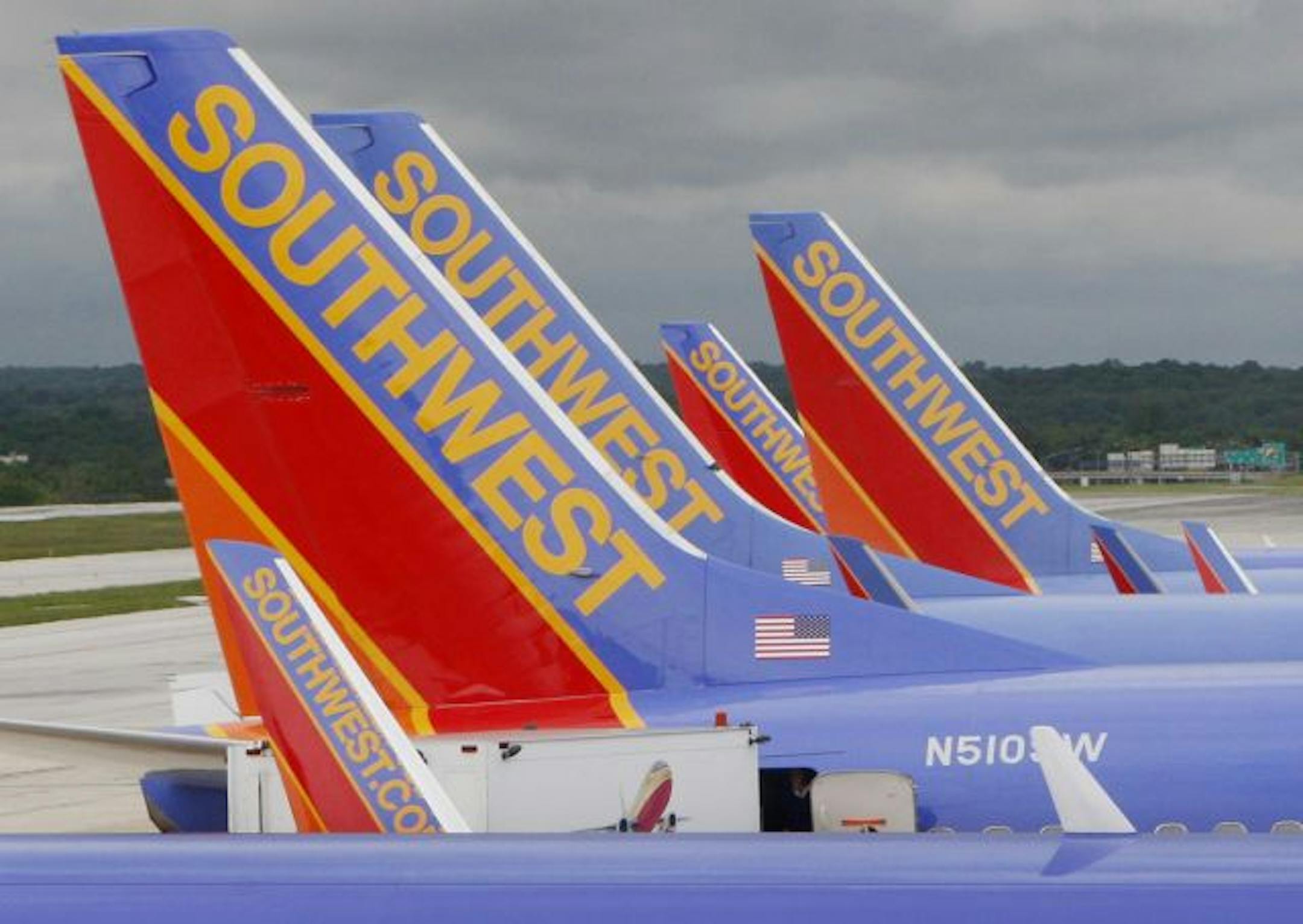 In this May 16, 2008 file photo, Southwest Airlines jets are seen parked at their gates at Baltimore Washington International Airport in Baltimore, Md. Southwest topped the list of best airlines according to Consumer Reports readers.