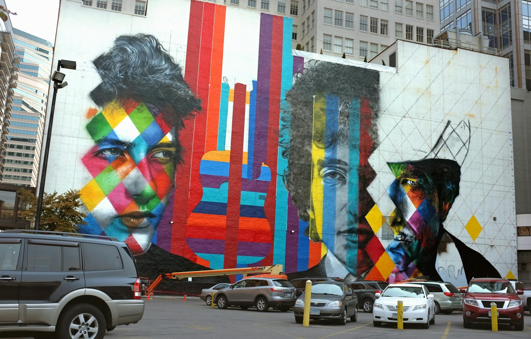 The former blank white wall facing the corner of 5th and Hennepin Ave shot Sunday, August 30, 2015. The 'canvas' for a mural by Brazillian artist Kobra- with multiple images of Bob Dylan.