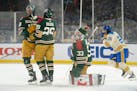 Minnesota Wild goaltender Cam Talbot (33) reacts to letting in his fifth goal of the game in the second period against the St. Louis Blues in the 2022