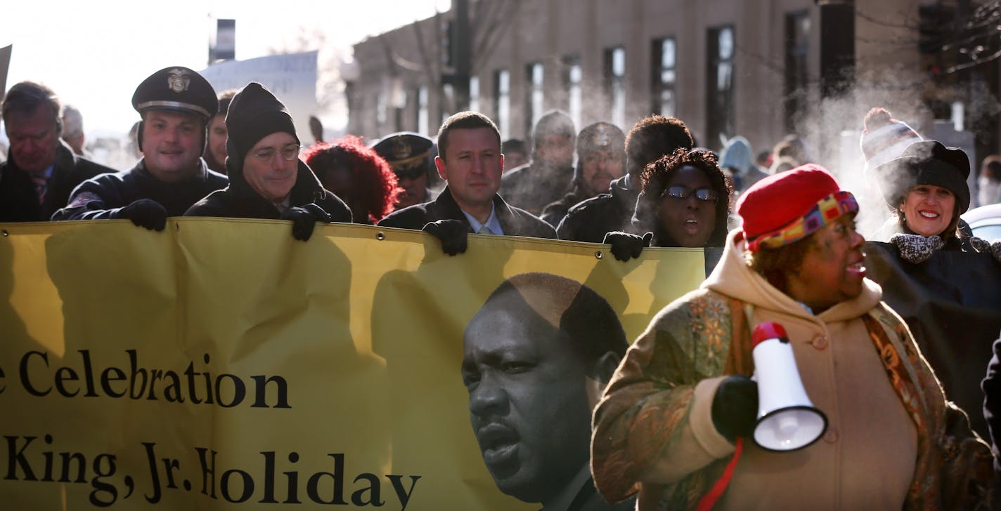 Hundreds braved sub-zero temps as the marched during Martin Luther King, Jr. Holiday celebration Monday January 18, 2016 in St. Paul, MN.