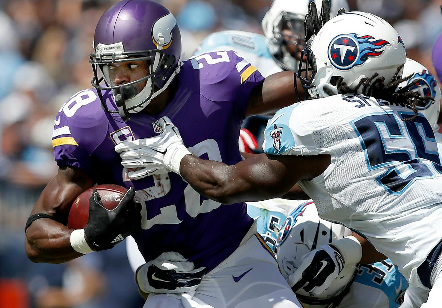 Minnesota Vikings quarterback Adrian Peterson during a run in the first quarter.