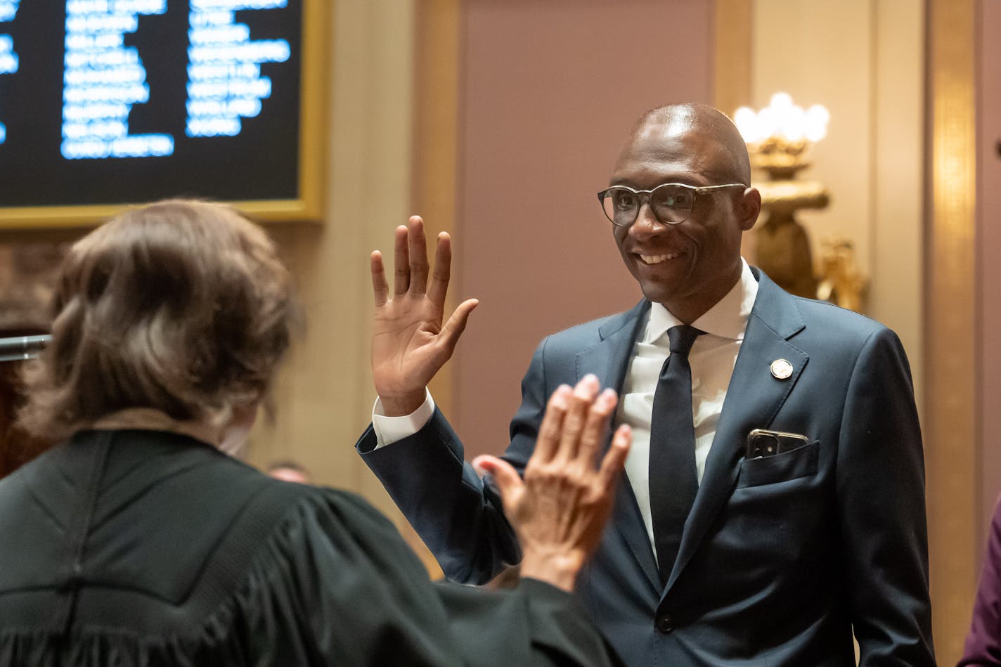 DFL Sen. Bobby Joe Champion was sworn in by State Supreme Court Justice Natalie Hudson as the first Black Senate President.