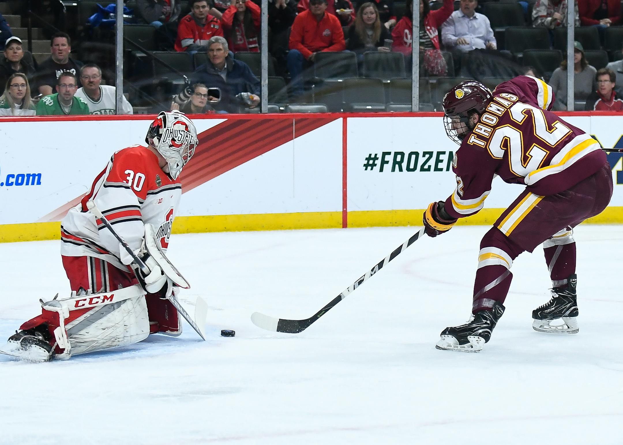 Minnesota-Duluth Bulldogs center Jared Thomas (22) scored a goal on Ohio State Buckeyes goaltender Sean Romeo (30) in the first period, putting the Bulldogs up 2-0. ] AARON LAVINSKY &#xef; aaron.lavinsky@startribune.com University of Minnesota Duluth played Ohio State University in an NCAA Frozen Four semifinal game on Thursday, April 5, 2018 at Xcel Energy Center in St. Paul, Minn.