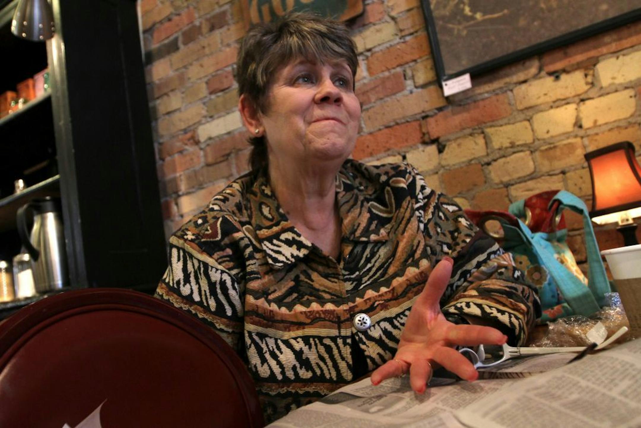 Debbie Christenson, of Ramsey MN., was photographed at a coffee shop on Main Street, in Anoka, on 5/10/13.