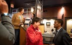 St. Paul Mayor Melvin Carter and Duluth Mayor Emily Larson talked with voters at a Main Street coffee shop in Ames, Iowa, on Jan. 31. They were stumpi