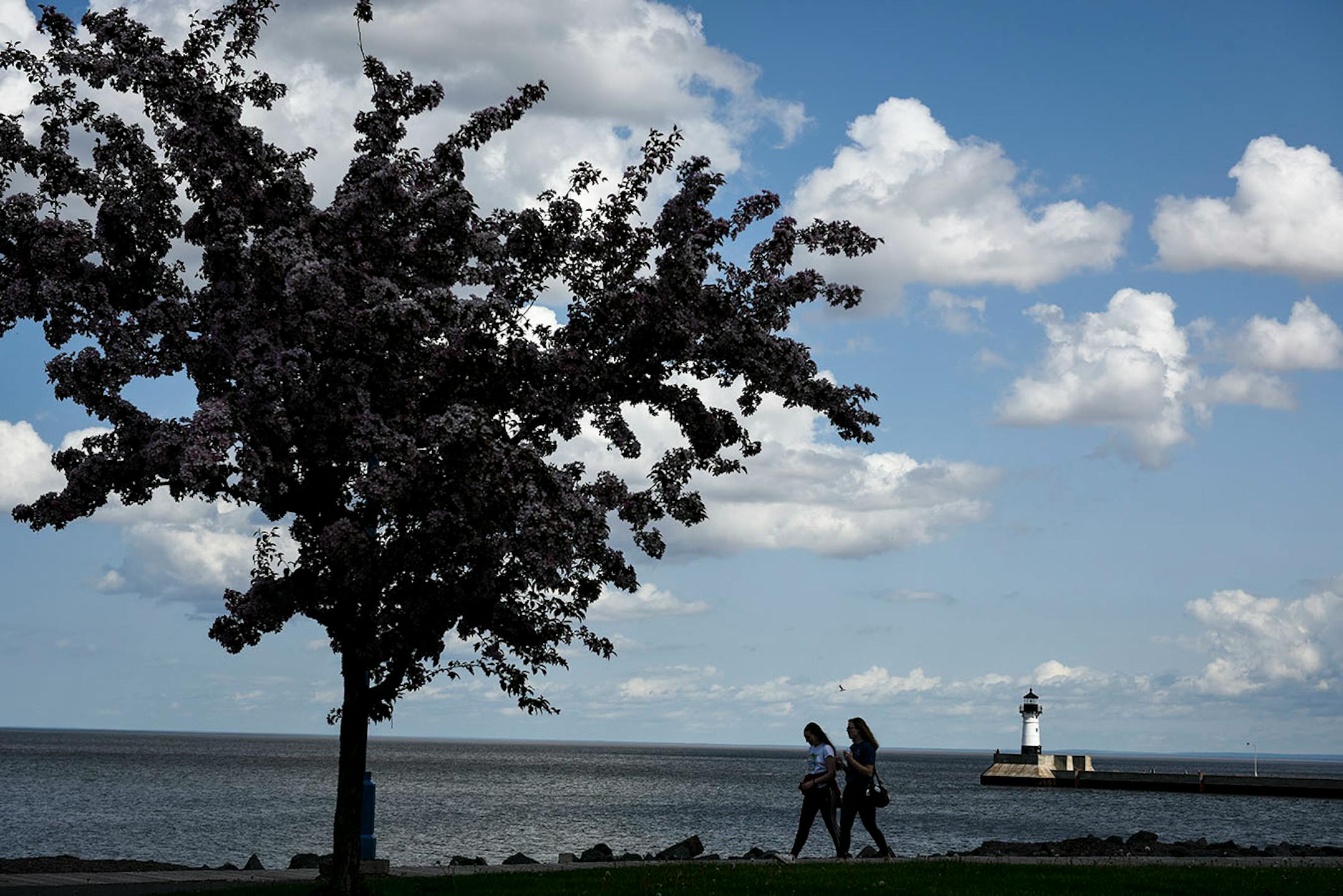 The scene along The Lakewalk in Canal Park Wednesday with the Duluth North Pier Lighthouse in the distance.