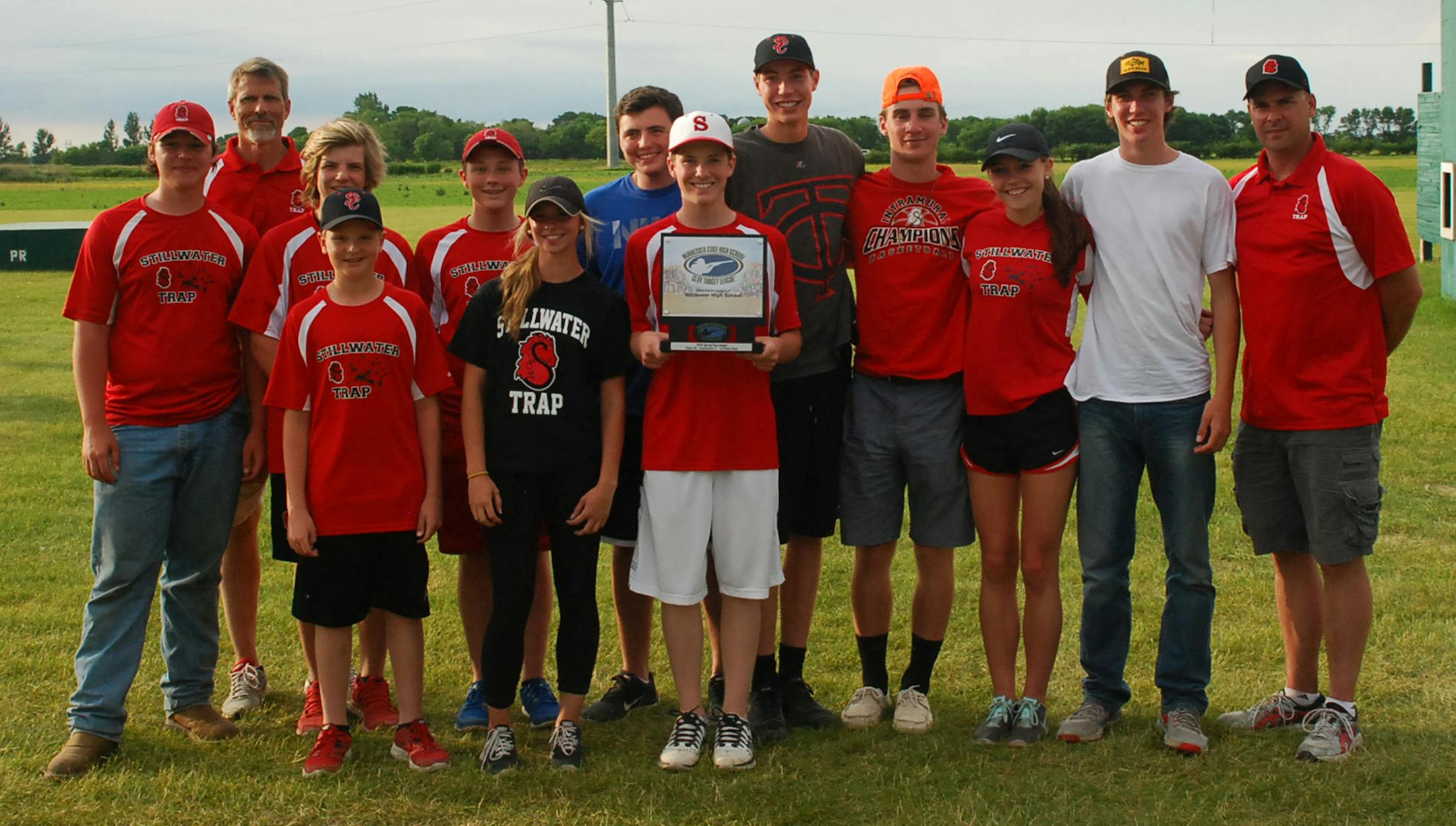 From left: Justin Thomas, Coach Eric Wahlstrom, Calvin Doyle, Eric Stack, John Stack, Emma Germundson, Danny LaQua, Cole Wahlstrom, Luke Simcik, Mathias Hoefferle, Alexis Wahlstrom, Jake Simcik, Coach Matt Simcik.