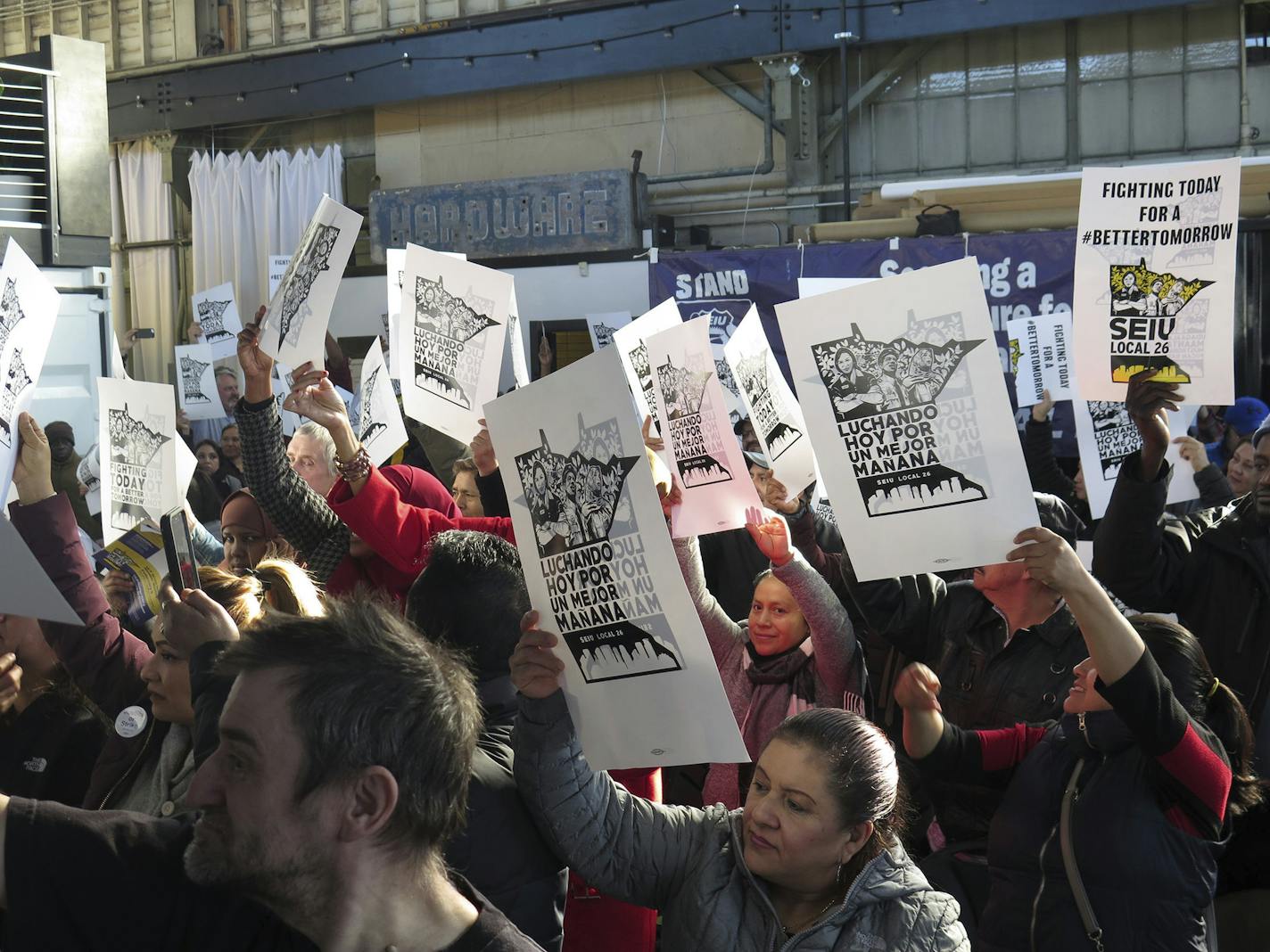 Members of the Service Employees International Union, which represents 6,500 Twin Cities janitors and security guards, vote to authorize a strike at SEIU Local 26 headquarters in Minneapolis on Saturday, Feb. 8, 2020. (Matt Sepic/Minnesota Public Radio via AP)