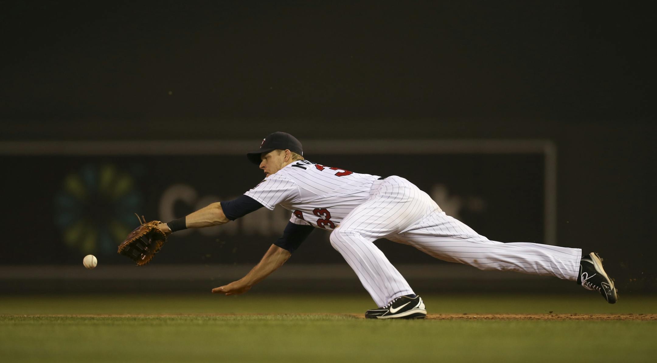 The Minnesota Twins lost the opening game of their series with the New York Yankees 10-4 Monday night, July 1, 2013 at Target Field in Minneapolis. Twins' first baseman Justin Morneau streatched for a grounder by the Yankees' Brett Gardner for the first New York hit in the ninth inning.