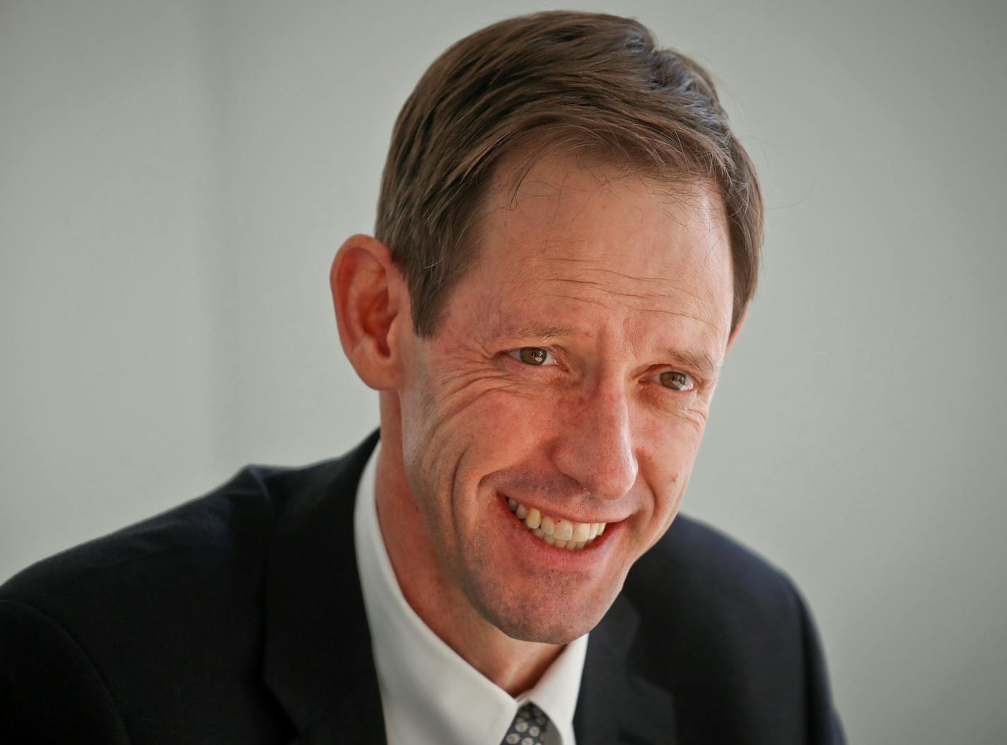 In this Tuesday Dec. 20, 2016, photo, De Beers diamond company CEO Bruce Cleaver poses for a photo, in New York. Cleaver spoke with The Associated Press about what younger people are buying and how the company tries to attract them. (AP Photo/Bebeto Matthews) ORG XMIT: NYBM401