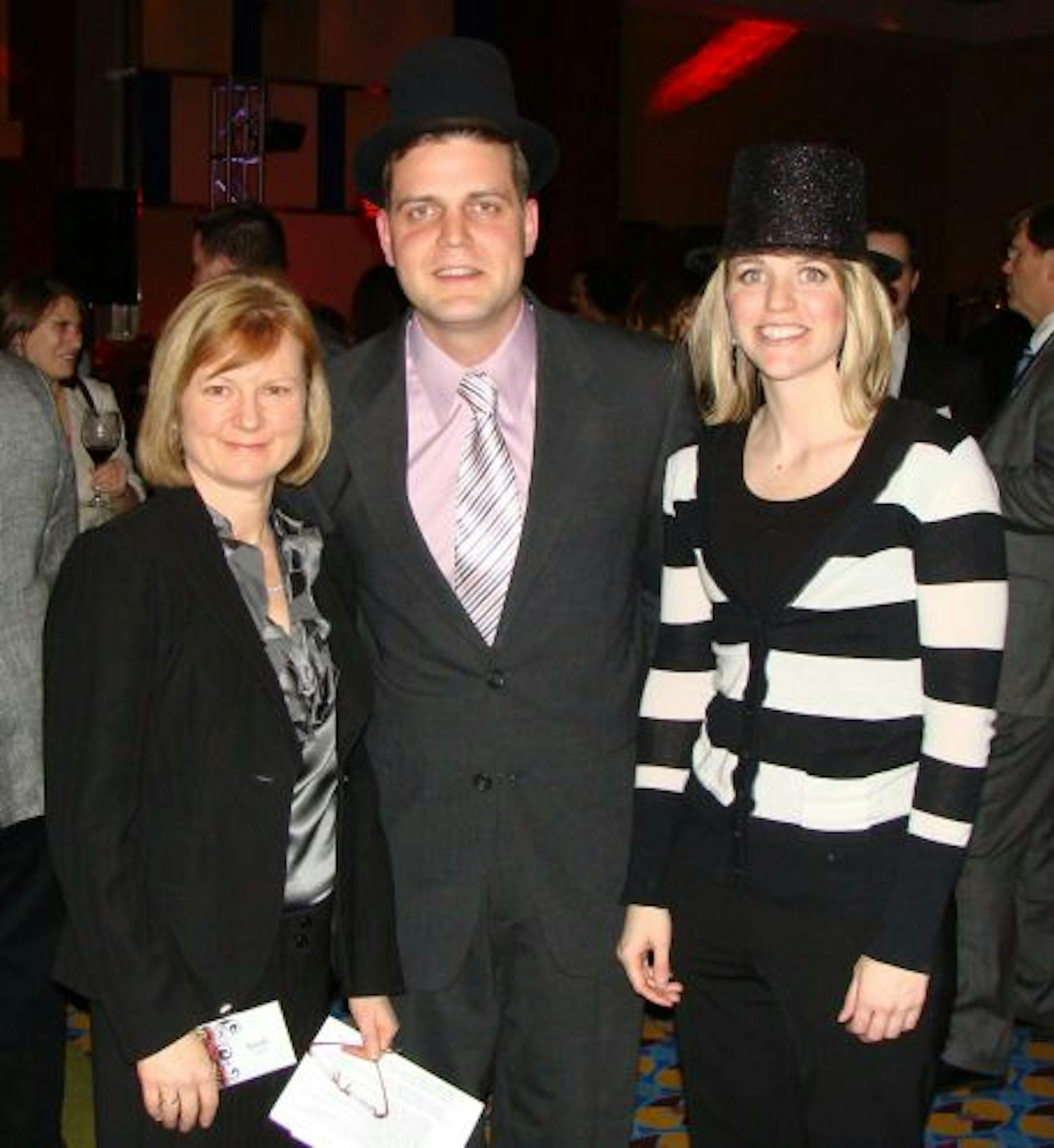 Sara Glassman, sglassman@startribune.com The United Way's Emerging Leaders wine tasting at the Marriott City Center had a French cabaret theme. Sarah Caruso, President and CEO, Greater Twin Cities United Way; Bryce White, chair of United Way�s Emerging Leaders and Katy Kimble