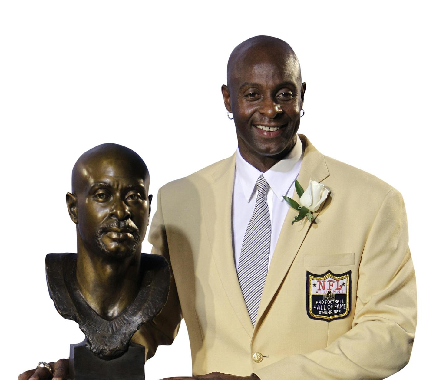 Former San Francisco 49ers great Jerry Rice poses with his bust after enshrinement in the Pro Football Hall of Fame in Canton, Ohio Saturday, Aug. 7, 2010. (AP Photo/Mark Duncan) ORG XMIT: OHMD121