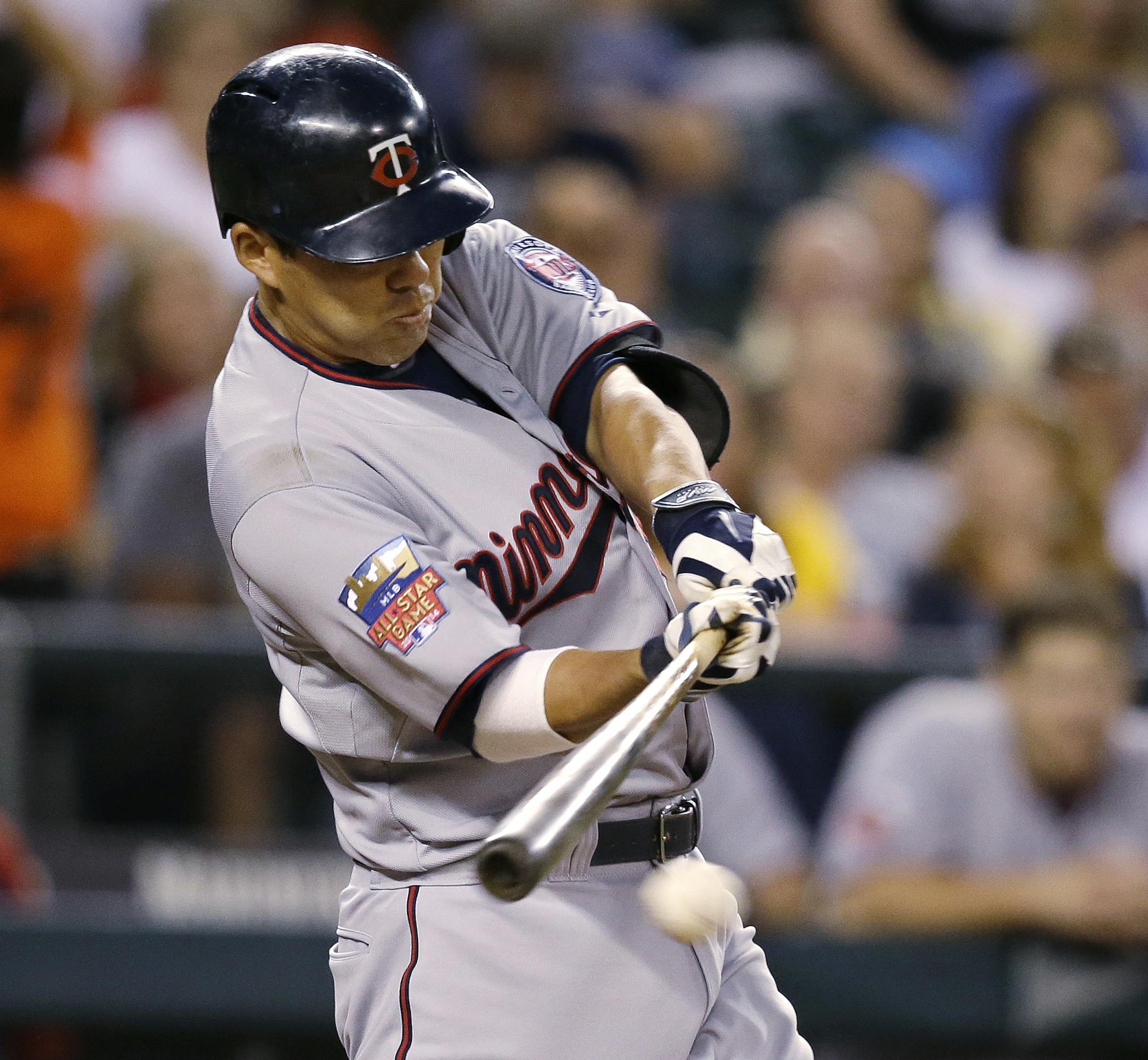 Minnesota Twins' Kurt Suzuki in action against the Seattle Mariners in a baseball game Monday, July 7, 2014, in Seattle. The Mariners won 2-0. (AP Photo/Elaine Thompson)