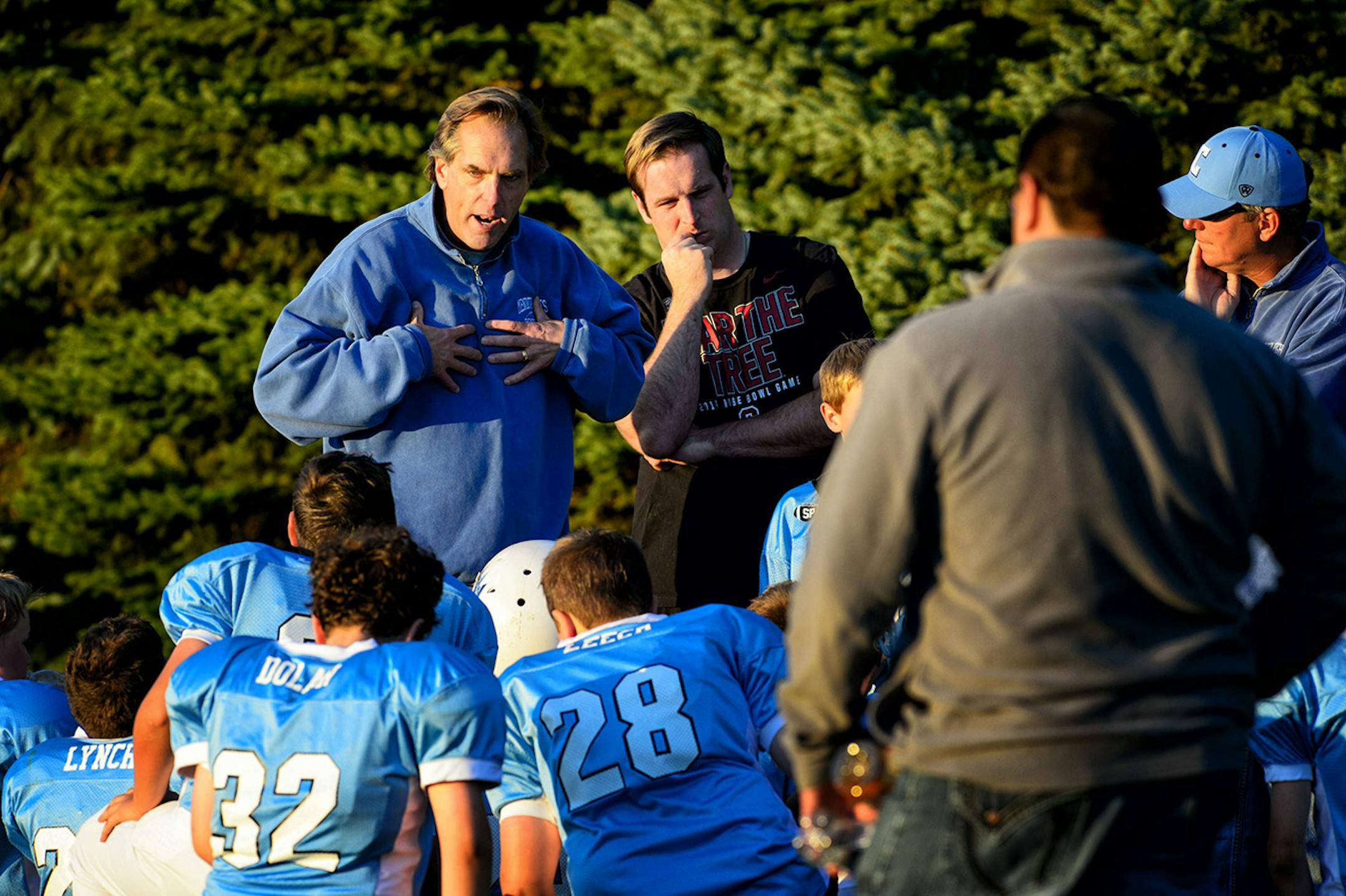 GOP candidate for Senate Mike McFadden talked to his team at halftime, on the right is his son and assistant coach Conor. He coached his son's football team Tuesday, September 16, 2014 in West St. Paul. It is part of the Mendota Heights Youth Athletic Association. ] Tuesday, September 16, 2014 GLEN STUBBE * gstubbe@startribune.com
