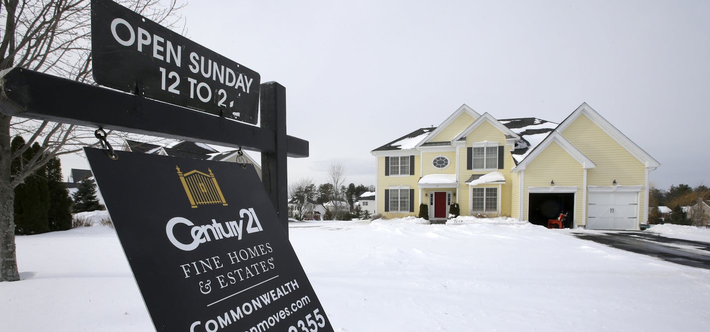 FILE- This Jan. 8, 2018, file, photo shows an existing home for sale in Walpole, Mass. On Thursday, Feb. 15, 2018, Freddie Mac reports on the week's average U.S. mortgage rates. (AP Photo/Steven Senne, File)