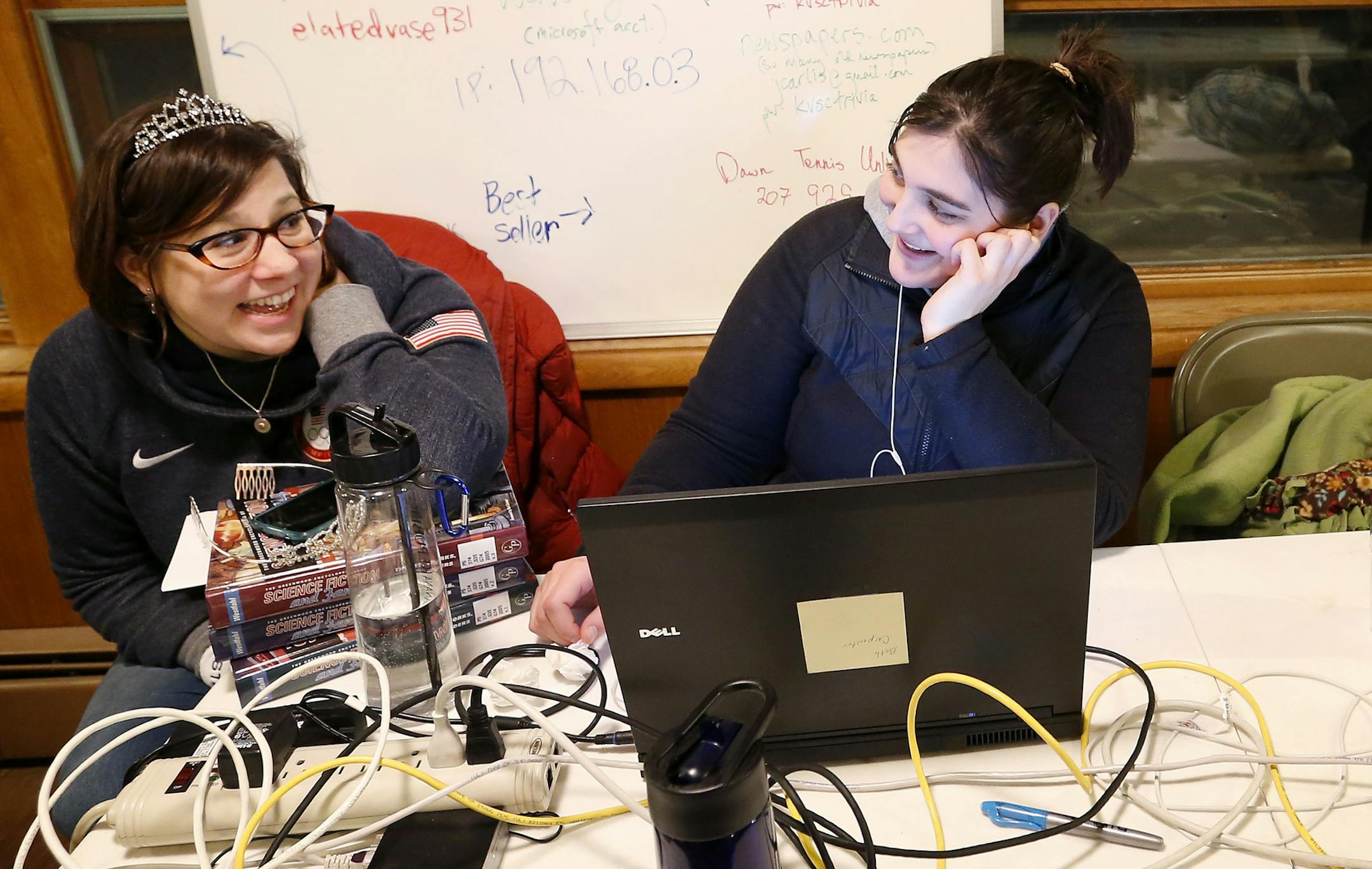 Stefan's Dream team members Rachel Babbitt, 36, of Minneapolis and Beth Carpenter, 26, of Bethany, West Virginia during the final hour of a 50-hour trivia contest. ] CARLOS GONZALEZ cgonzalez@startribune.com, February 15, 2015, St. Cloud, Minn., Trivia, Each February, dozens of teams gather in basements in St. Cloud and beyond, hunkering down for a trivia contest that's tough partly because of how long it lasts -- 50 hours. Put on by the college radio station