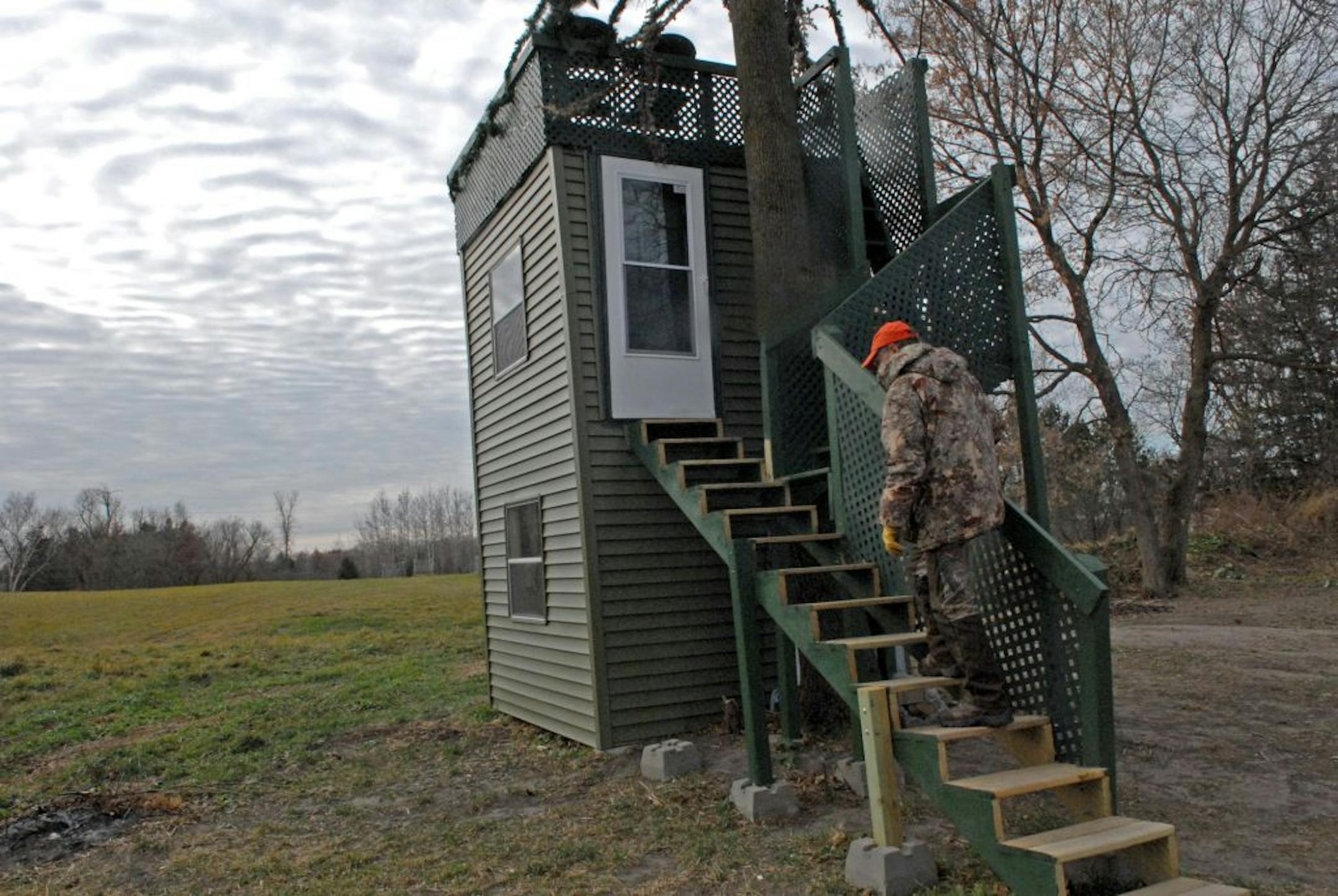 The first two stories of a "deer stand'' that Dave Kannegaard and his son, Chuck, built on their property are enclosed. The third is open and is used more often for bow hunting.