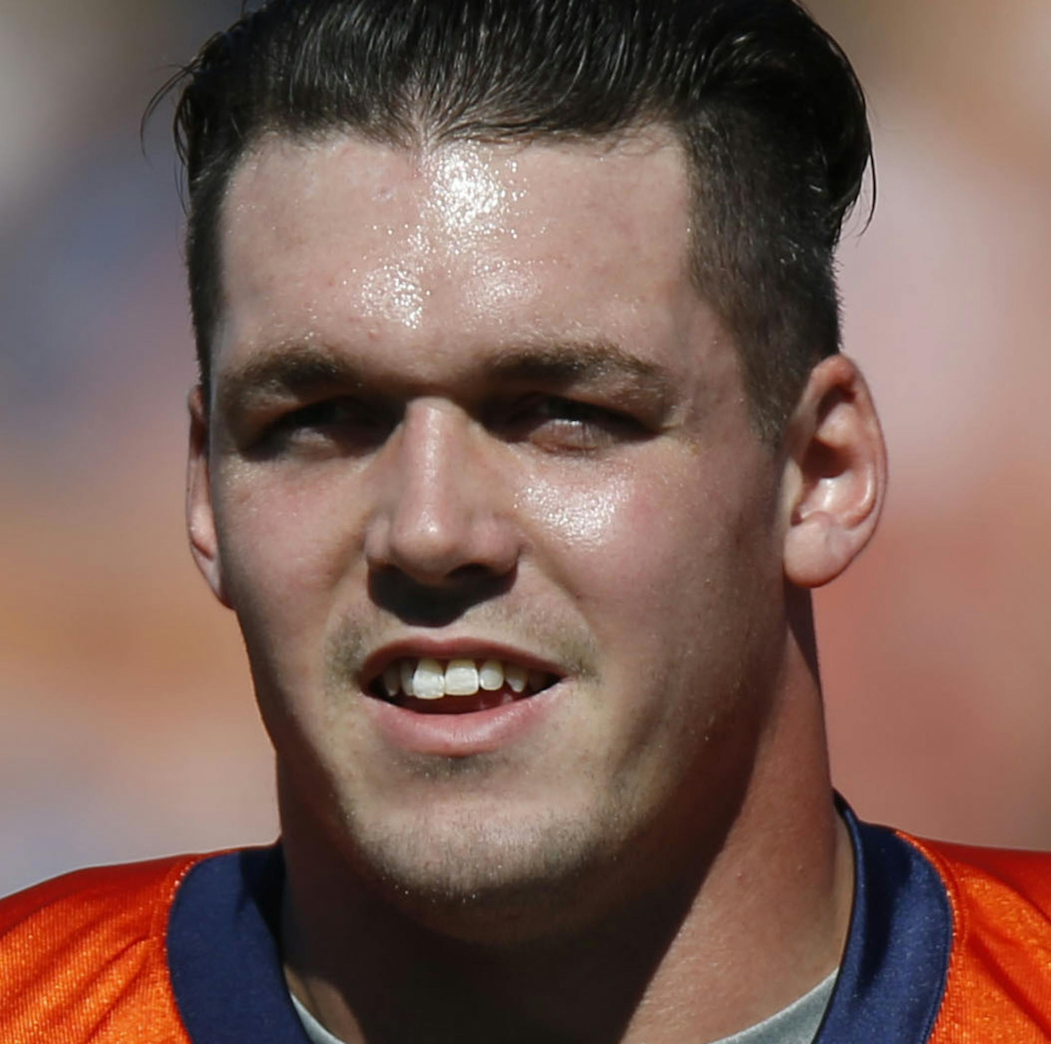Denver Broncos defensive end Derek Wolfe (95) at the team's NFL football training camp Friday, July 31, 2015, in Englewood, Colo. (AP Photo/David Zalubowski) ORG XMIT: OTKDZ190