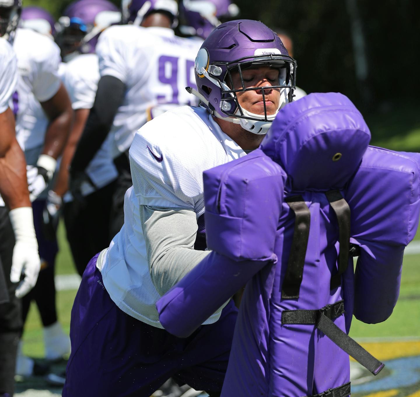 Vikings defensive end Tashawn Bower ran through blocking sled drills