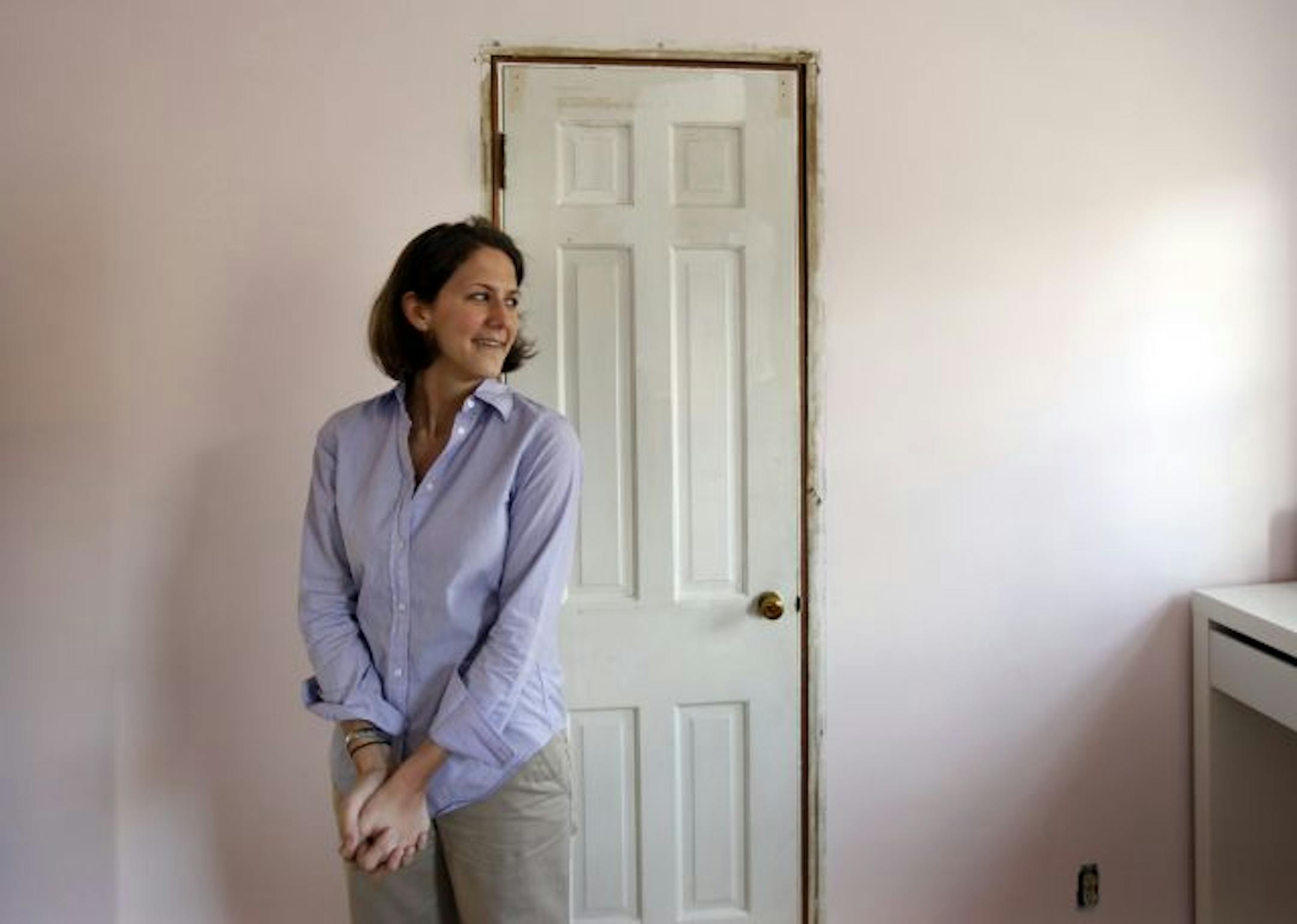 Sarah Kiefer bought her three-bedroom home with fireplace in the Jordan neighborhood last year for $75,000. "You get a lot of house for the money," she said.