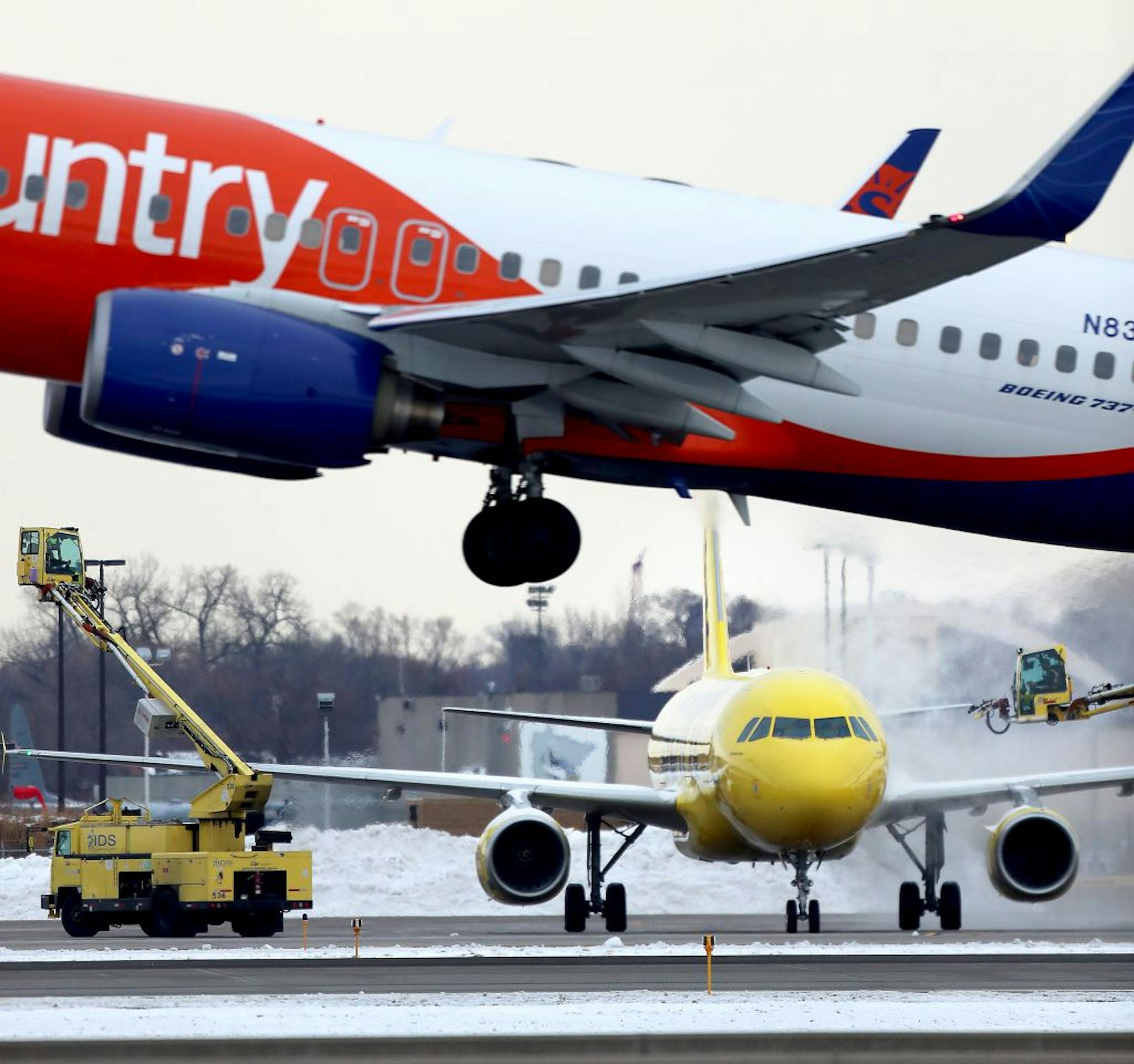 A Spirit Airlines plane was de-iced and a Sun Country plane took off at Minneapolis-St. Paul International Airport earlier this month.