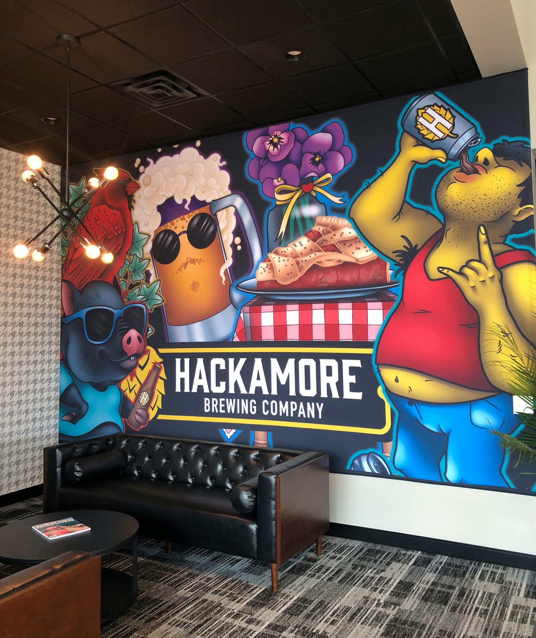 The brewery's entrance features artwork by Jordanne LeFae and Pip Arnes of Weird Ink Society in St. Paul that incorporates the label design, as well as one of the several seating areas. Nicole Hvidsten, Star Tribune